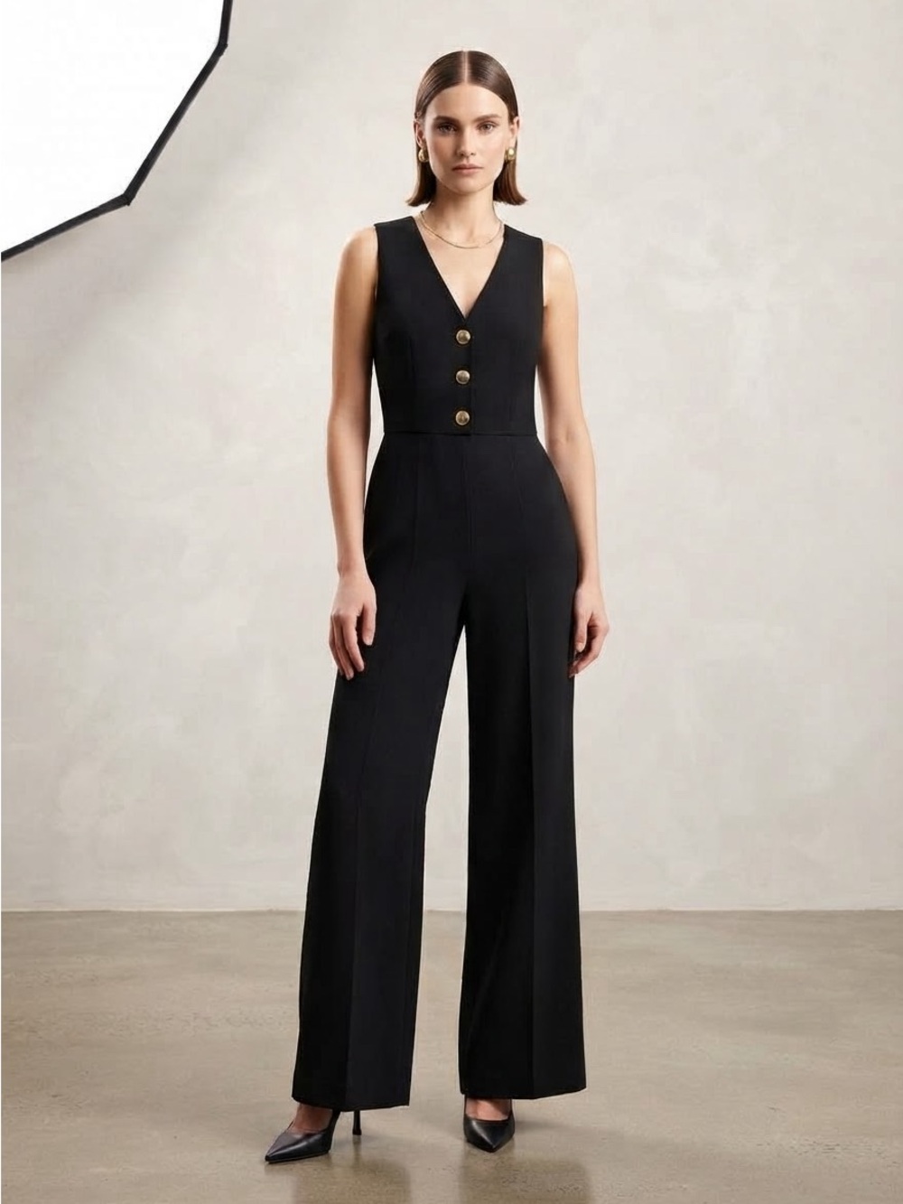 Alice + Olivia Black Sleeveless V-Neck Jumpsuit with Gold Buttons and Wide Legs